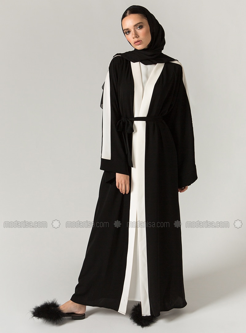 white and black abaya