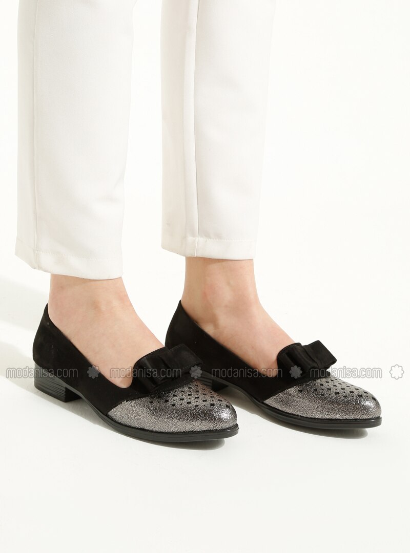 black and silver flat shoes