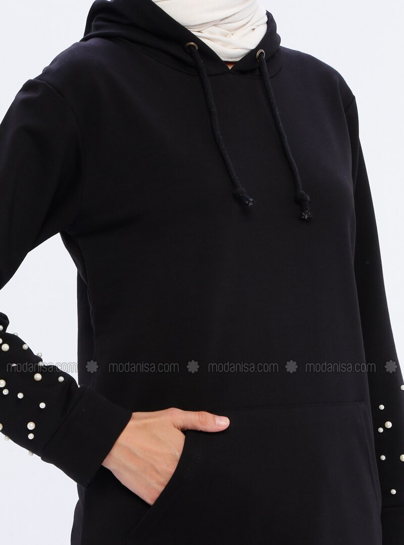 black tracksuit top