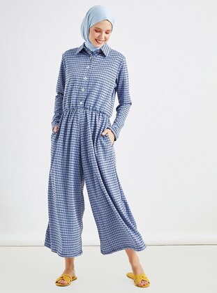 bebe blue jumpsuit