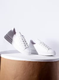 أبيض - حذاء رياضي - أحذية رياضية