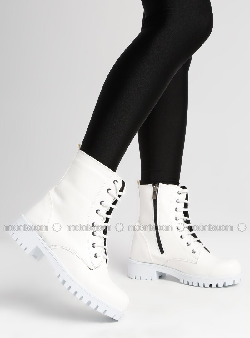 white boots with black tights