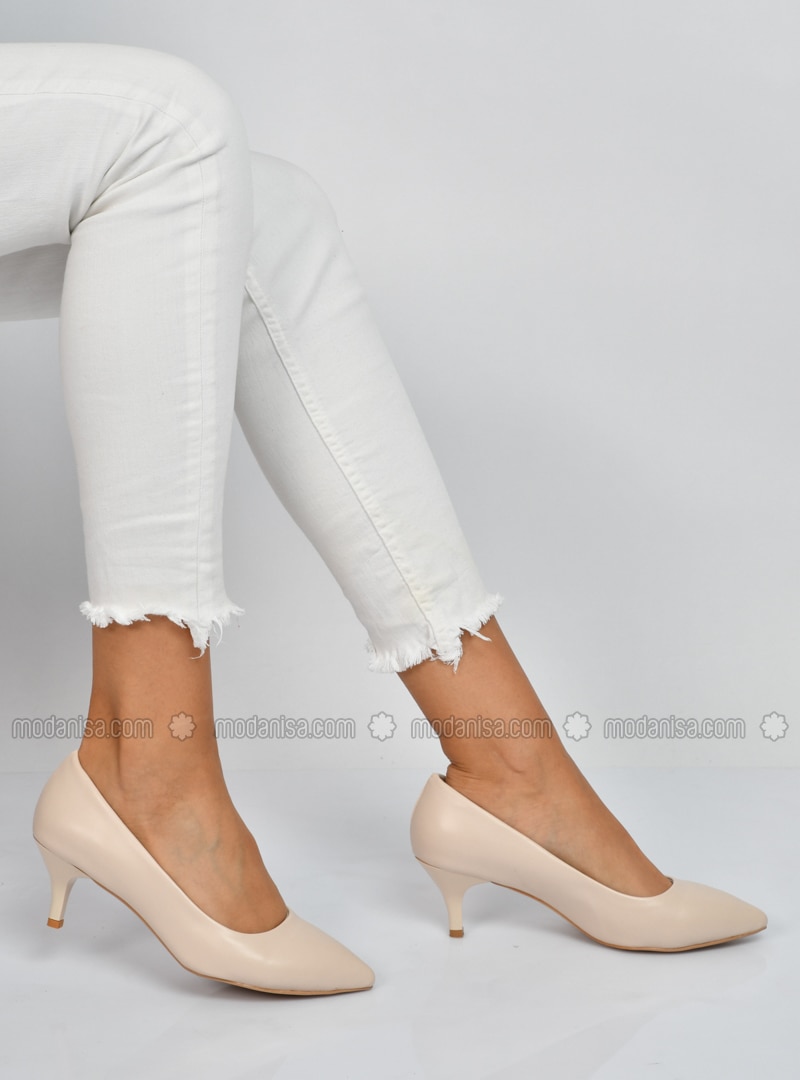cream high heel shoes