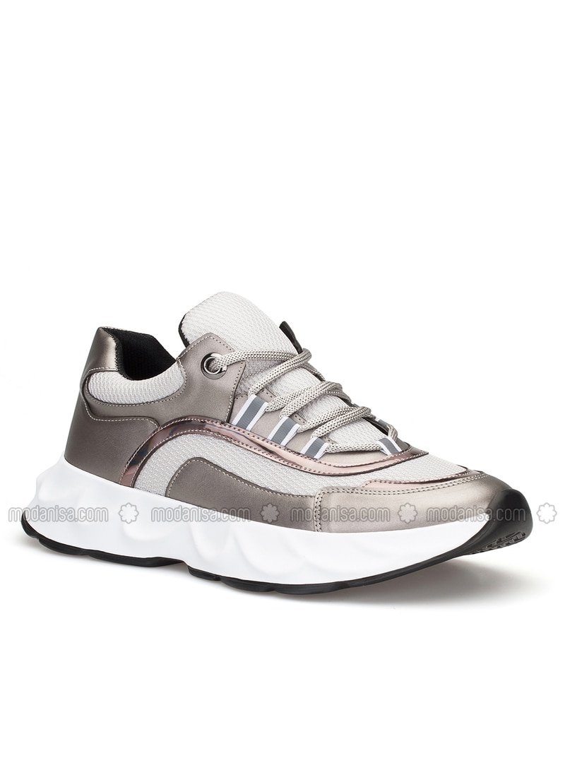 silver sports shoes