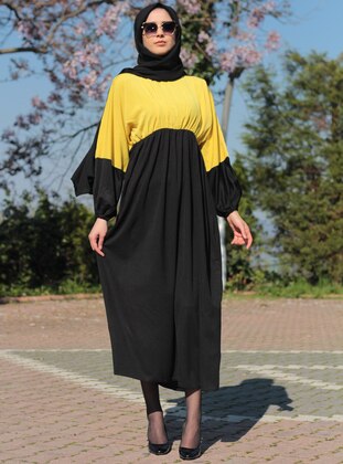 yellow and black formal dress