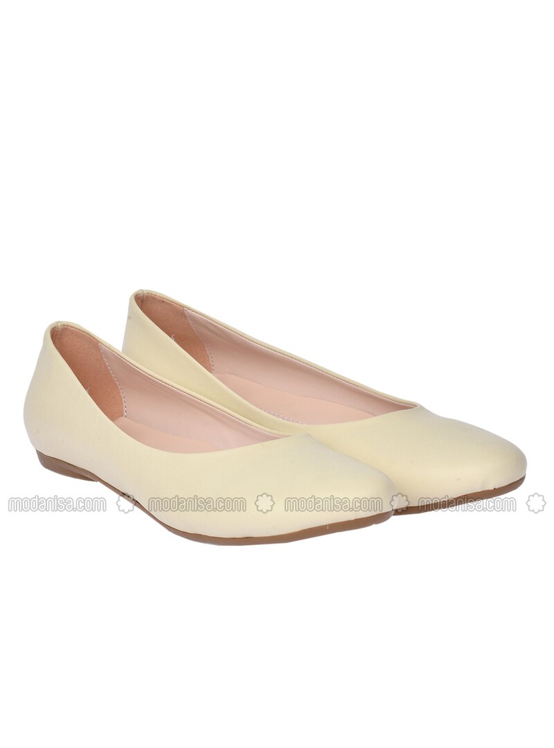 cream flat shoes