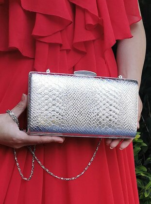 red and silver clutch bag