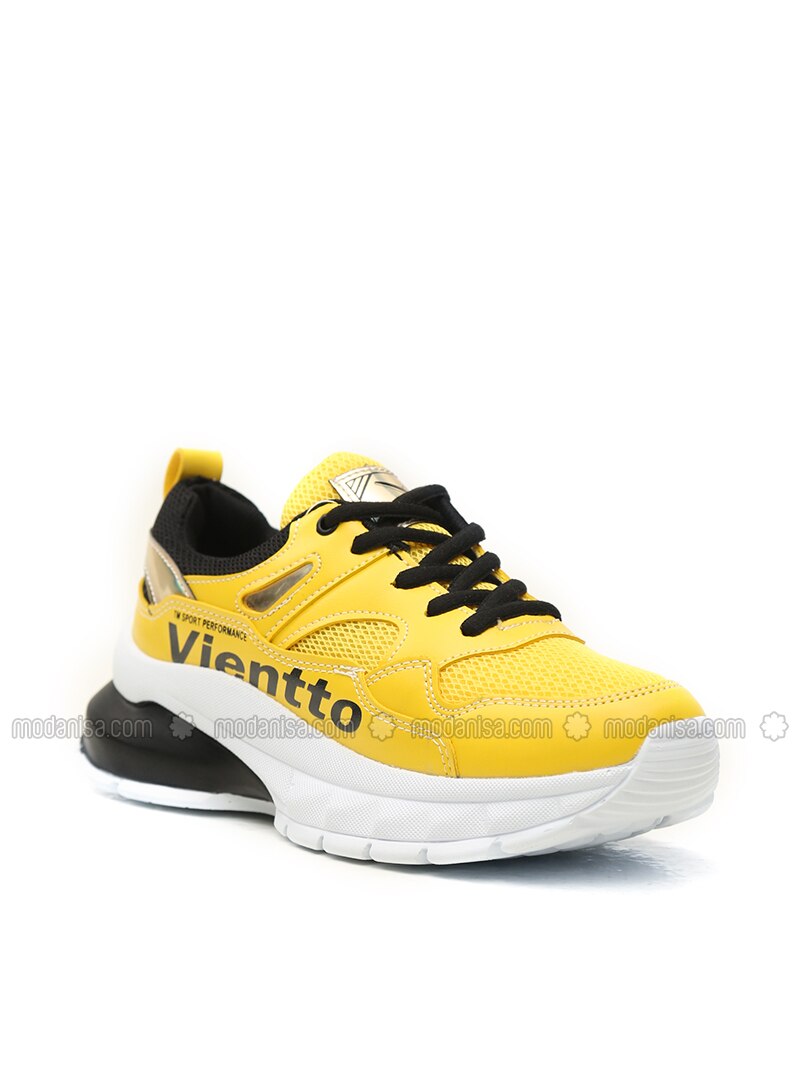 yellow black tennis shoes