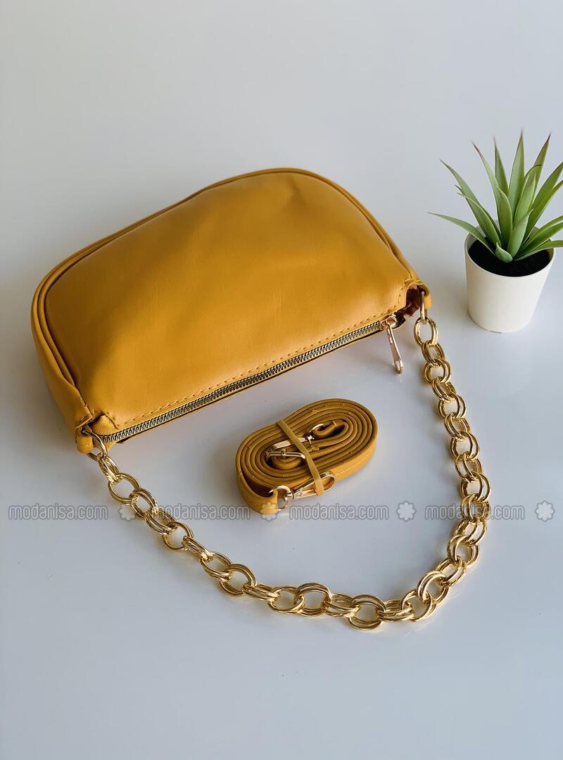 mustard clutch bag