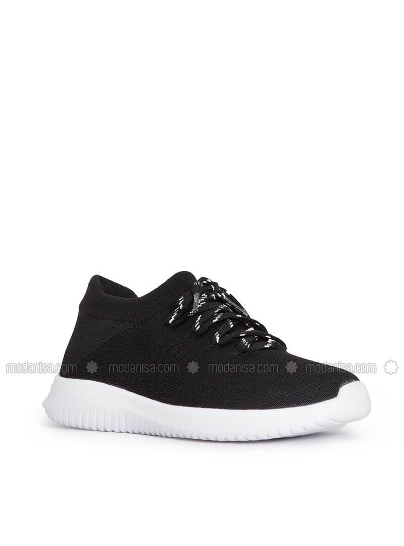 black sports shoes with white sole