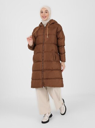 Olcay Tan Puffer Jackets